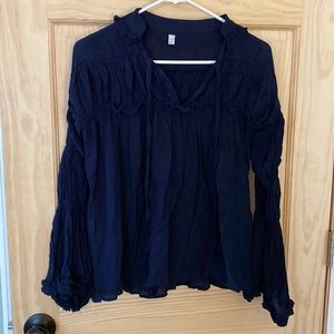 Korean top w elastics in sleeves and flared at wrists